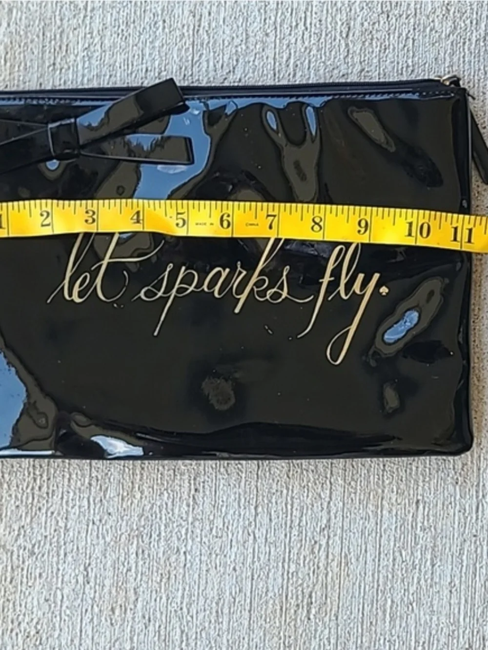 KATE SPADE Let Sparks Fly Black Patent Pouch